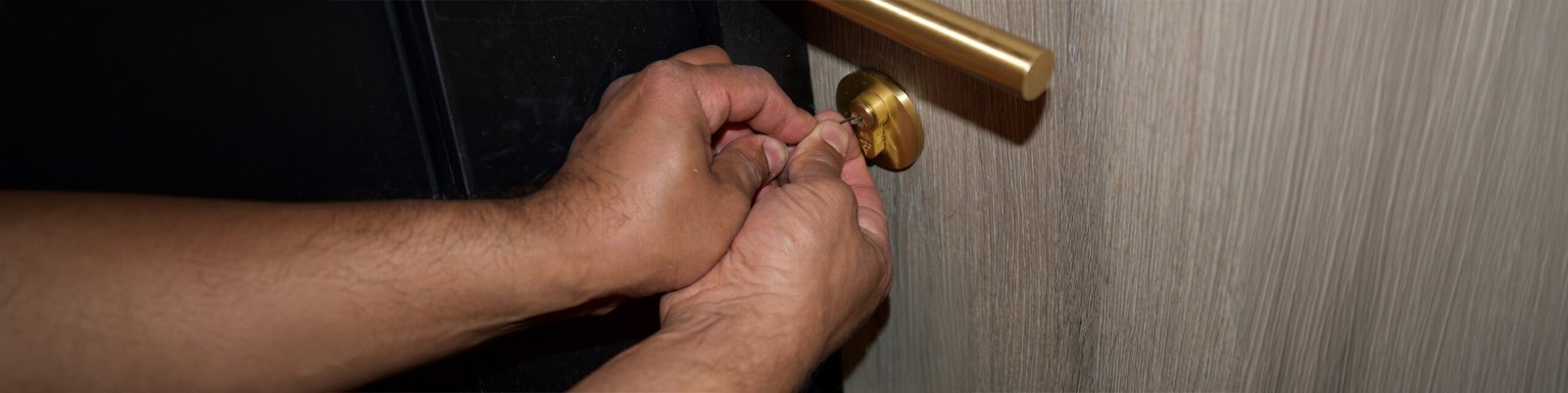 Snapped key blade being extracted from a door lock cylinder