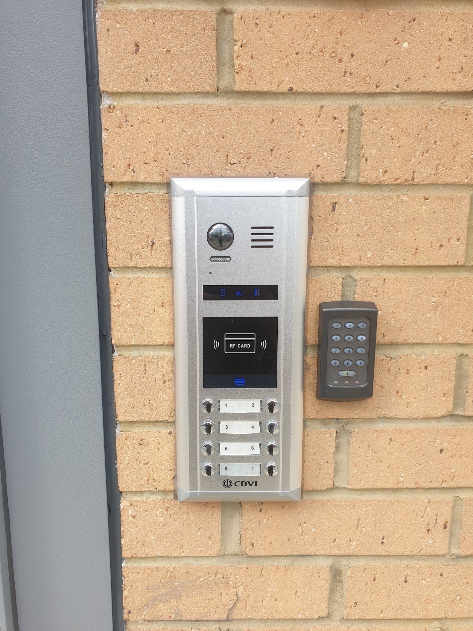 Keypad smart lock installed on a London front door with mechanical key backup